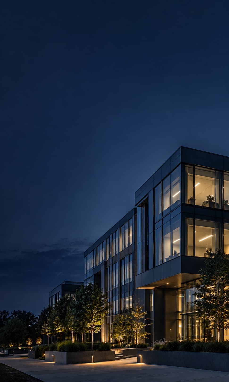Illustration of a commercial office building at dusk